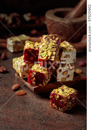 Turkish delight with nuts and dried fruits. 97920902