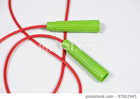 Red green rope on white background close-up 97922945