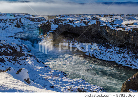 First snow around Godafoss waterfall in northern Iceland 97923360