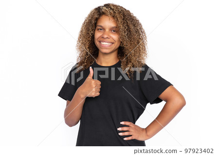 Happy African American woman showing thumb up Happy African American woman showing thumb up 97923402