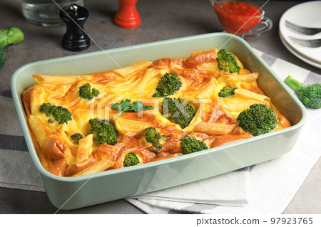 Tasty broccoli casserole in baking dish on table Tasty broccoli casserole in baking dish on table 97923765