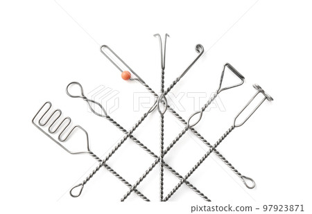 Set of logopedic probes on white background, top view. Speech therapist's tools Set of logopedic probes on white background, top view. Speech therapist's tools 97923871