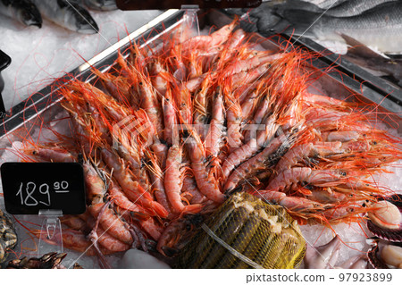 Fresh shrimps and other seafood on ice. Wholesale market Fresh shrimps and other seafood on ice. Wholesale market 97923899