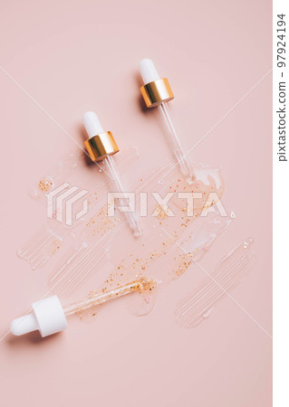 Pipette with cosmetic product, drops and smears, cosmetic texture, serum, cream mask, gel, hyaluron 97924194