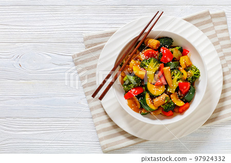 veggies stir-fry with thick soy based sauce 97924332