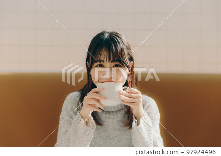 young college girl in cafe 97924496