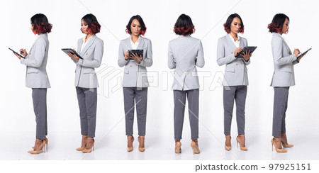 Full length 20s Asian Woman wear formal Business dress blazer high heel shoes. Black short curl hair female feel happy smile hold tablet, 360 front side rear back over white background isolated 97925151