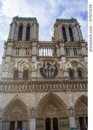 Notre Dame Cathedral facade in the early morning (France - Paris) 97925836