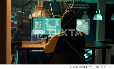 Hackers using network vulnerability to exploit security server, trying to break computer system at night. People working with multiple monitors to hack software, illegal hacktivism. Hackers using network vulnerability to exploit security server, trying to break computer system at night. People working with multiple monitors to hack software, illegal hacktivism. 97926008