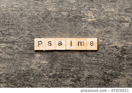 psalms word written on wood block. psalms text on table, concept 97926851