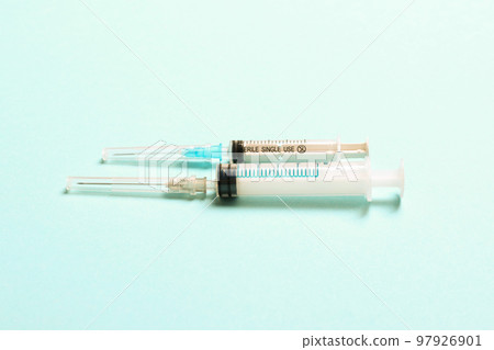 Top view of medical syringes on colorful background. Health care concept with copy space Top view of medical syringes on colorful background. Health care concept with copy space 97926901
