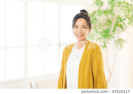 woman relaxing in the room woman relaxing in the room 97928217