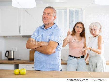 Upset father standing in the kitchen Upset father standing in the kitchen 97929266
