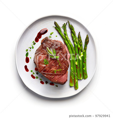 Grilled beef steaks medium rare with spices on white dish (Created with Generative AI technology). 97929941