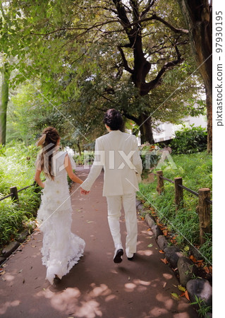 back view of happy bride and groom back view of happy bride and groom 97930195
