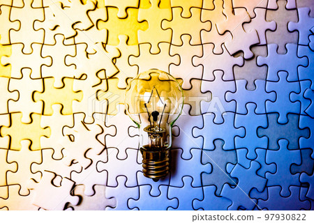 Sparking ideas Background texture of light bulbs and disjointed jigsaw puzzles Strategies Bright and dark rainbow colors 97930822
