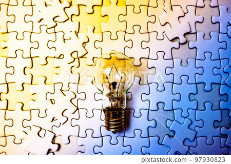Sparking ideas Background texture of light bulbs and disjointed jigsaw puzzles Strategies Bright and dark rainbow colors 97930823