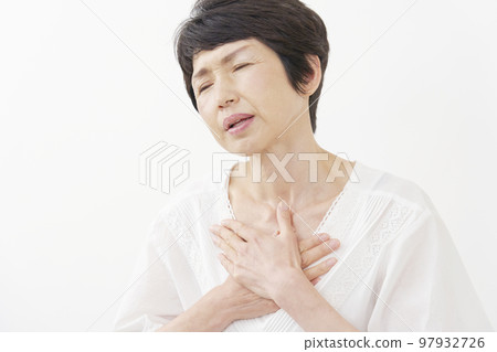Middle-aged woman with palpitations White background 97932726