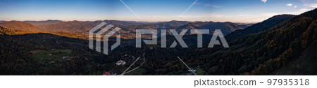 Panorama of a village in the mountains in the shadow of the mountains. 97935318