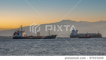 cargo ship on Kamchatka peninsula in Avacha bay 97935849