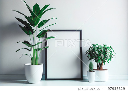 Mockup of empty frame displayed inside room interior with white wall background and plant pot nearby Mockup of empty frame displayed inside room interior with white wall background and plant pot nearby 97937829