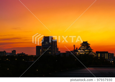 Osaka Castle at dusk dyed red Osaka Castle at dusk dyed red 97937930