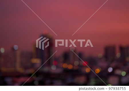 Sunset clear sky background before night over the bokeh light of the city 97938755