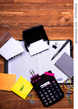 Business cards in holder, colored clips and elastics with stickers 97938858