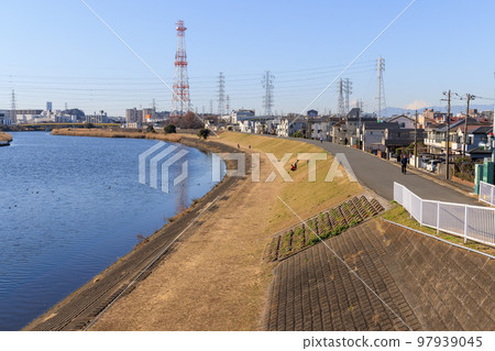 River embankment and cityscape on a sunny day 97939045