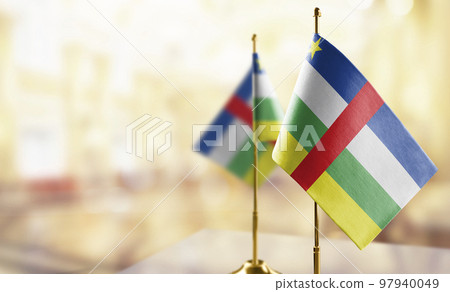Small flags of the Central African Republic on an abstract blurry background Small flags of the Central African Republic on an abstract blurry background 97940049