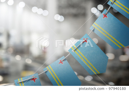 A garland of Aruba national flags on an abstract blurred background A garland of Aruba national flags on an abstract blurred background 97940180
