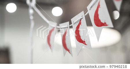 A garland of Easter Island national flags on an abstract blurred background A garland of Easter Island national flags on an abstract blurred background 97940218