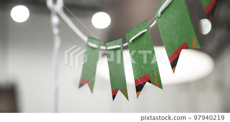 A garland of Zambia national flags on an abstract blurred background A garland of Zambia national flags on an abstract blurred background 97940219