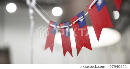 A garland of Taiwan national flags on an abstract blurred background A garland of Taiwan national flags on an abstract blurred background 97940221