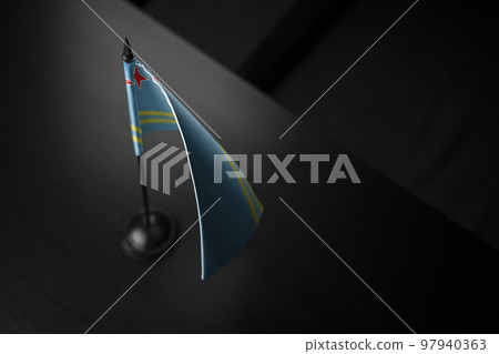 Small national flag of the Aruba on a black background Small national flag of the Aruba on a black background 97940363