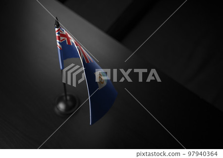 Small national flag of the Anguilla on a black background Small national flag of the Anguilla on a black background 97940364