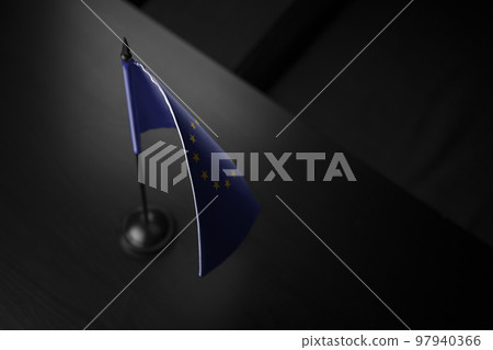Small national flag of the European Union on a black background Small national flag of the European Union on a black background 97940366