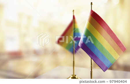 Small flags of the lgbt on an abstract blurry background Small flags of the lgbt on an abstract blurry background 97940404