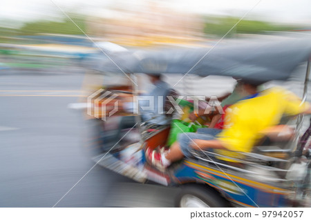 Traditional tuk-tuk from Bangkok, Thailand, in motion blur 97942057