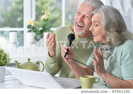 old couple husband and wife singing songs old couple husband and wife singing songs 97942100