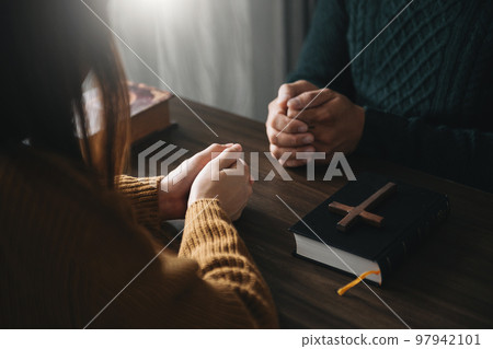 Christians are congregants join hands to pray and seek the blessings of God, the Holy Bible.Study of God Christians are congregants join hands to pray and seek the blessings of God, the Holy Bible.Study of God 97942101