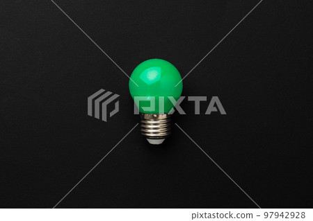 One light bulb on black background top view One light bulb on black background top view 97942928