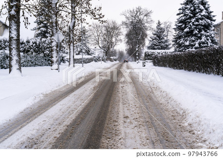 Danger driving in winter on snowy road Danger driving in winter on snowy road 97943766