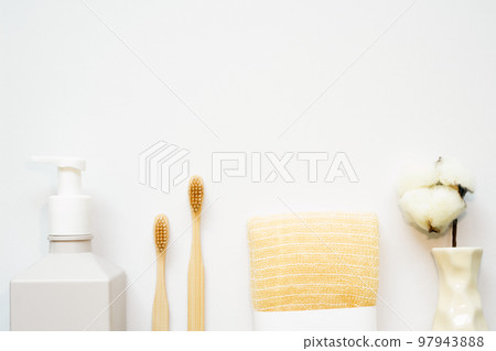 Bathroom spa products. shampoo, shower soap, towel, toothbrush on white background. flat lay, top view, copy space 97943888