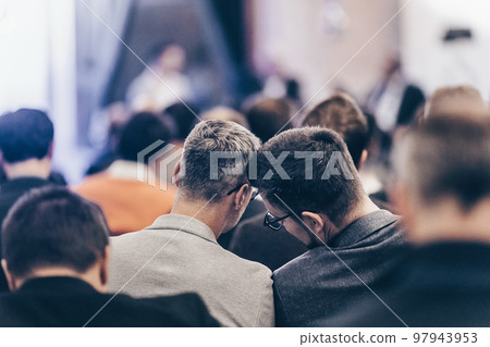 Round table discussion at business convention and Presentation. Audience at the conference hall. Business and entrepreneurship symposium. 97943953