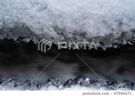 ice in irrigation canal 97946871
