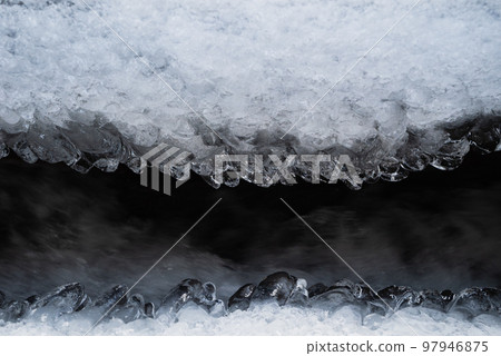 ice in irrigation canal 97946875