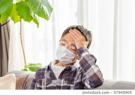 boy with headache boy with headache 97948909