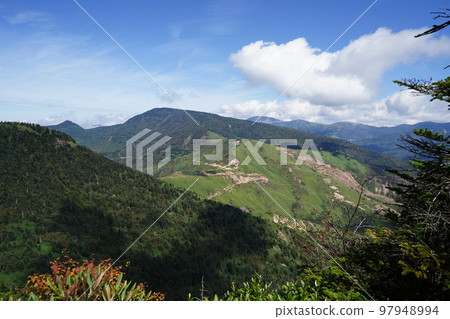 Head for Mt. Donabe from Mt. Hafu on the Gunma Prefectural Boundary Ridge Trail. View of Kenashi Pass from the summit of Mt. Donabe September 26, 2022 Head for Mt. Donabe from Mt. Hafu on the Gunma Prefectural Boundary Ridge Trail. View of Kenashi Pass from the summit of Mt. Donabe September 26, 2022 97948994