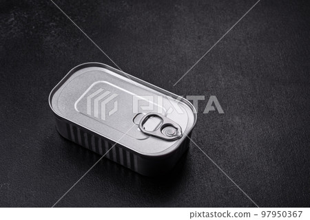 Tin or aluminum rectangular can of canned food with a key 97950367